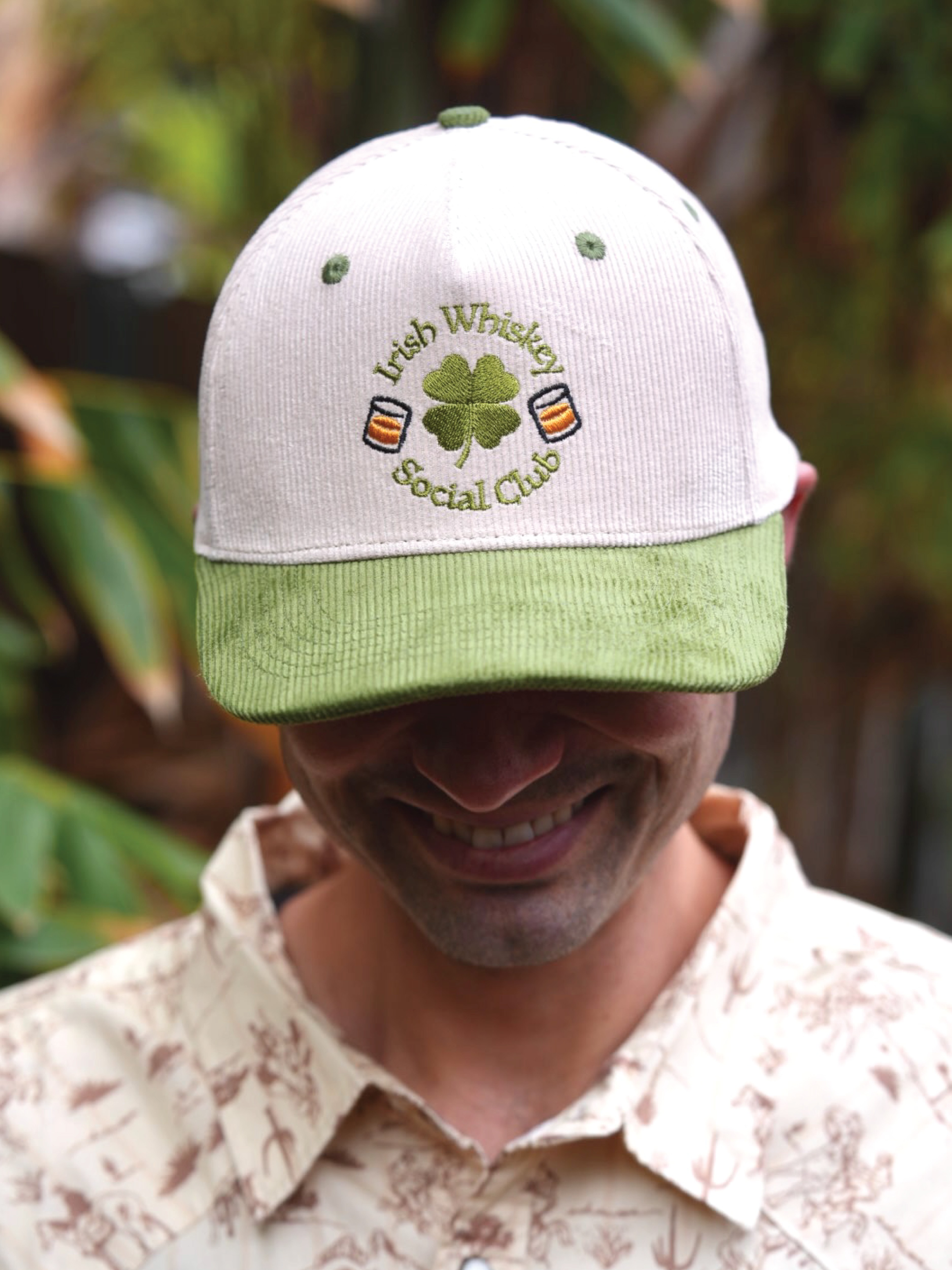 Celebrate St. Patrick's Day with this Irish Whiskey Social Club hat, custom embroidered for a stylish whiskey lover's look.