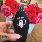 Gothic coffin-shaped flask – the perfect spirit accessory for goth and emo vibes in sunny San Diego, California.
