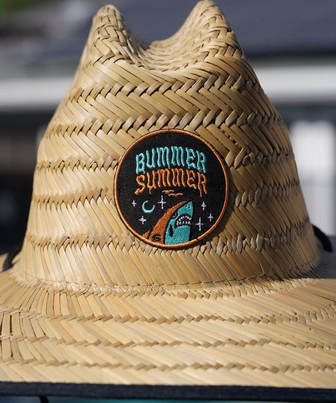 Moxxie Bummer Summer Beach Hat – lifeguard-style sun hat with traditional tattoo flash for a sad summer vibe.