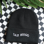 Stay cozy and emo with the black Sad Diego beanie – perfect for embracing your sad side at Emo Night.