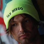 Stand out with the neon yellow Sad Diego beanie, perfect for showcasing your sad, emo vibes.