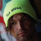 Stand out with the neon yellow Sad Diego beanie, perfect for showcasing your sad, emo vibes.