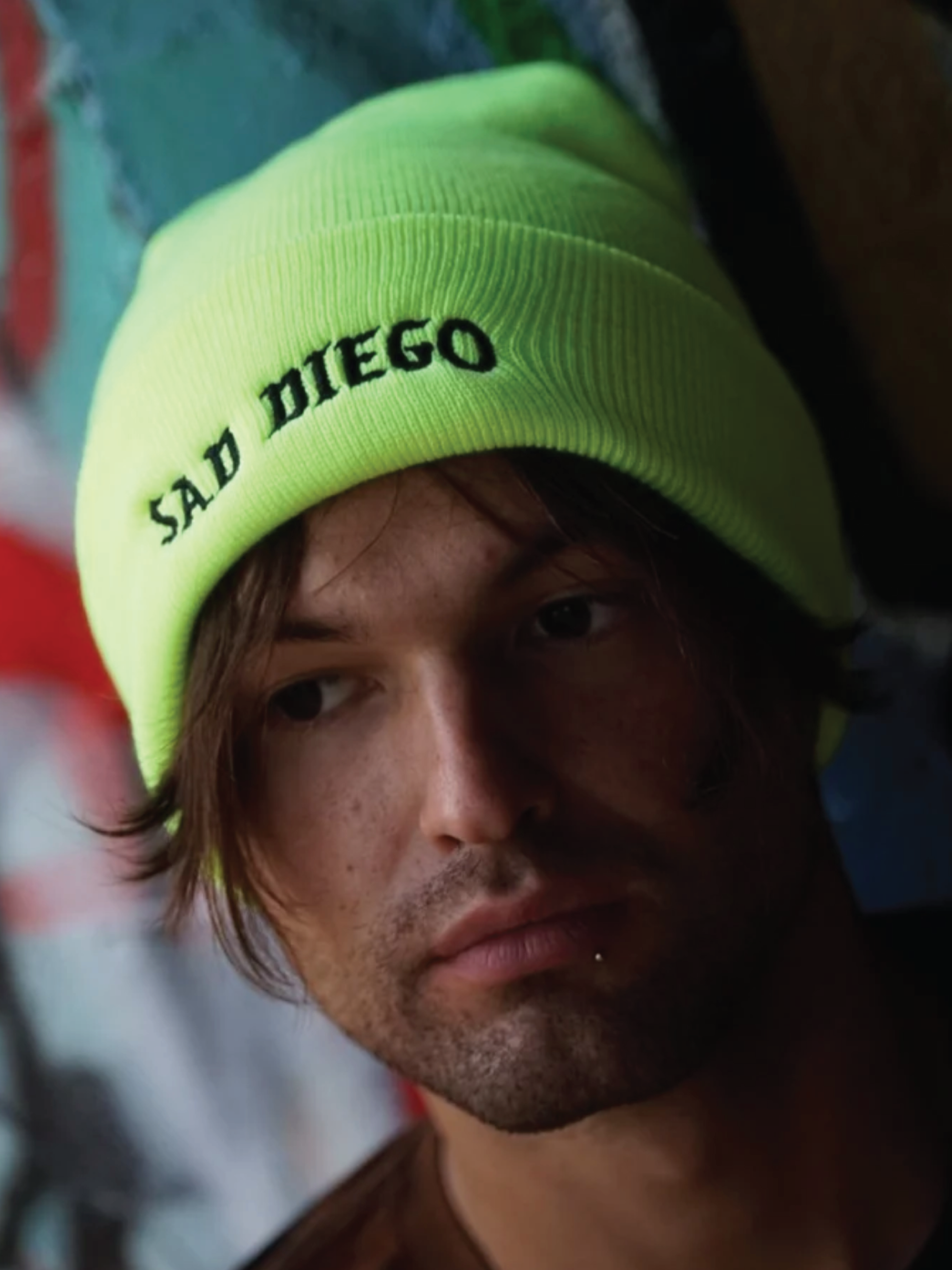 Stand out with the neon yellow Sad Diego beanie, perfect for showcasing your sad, emo vibes.