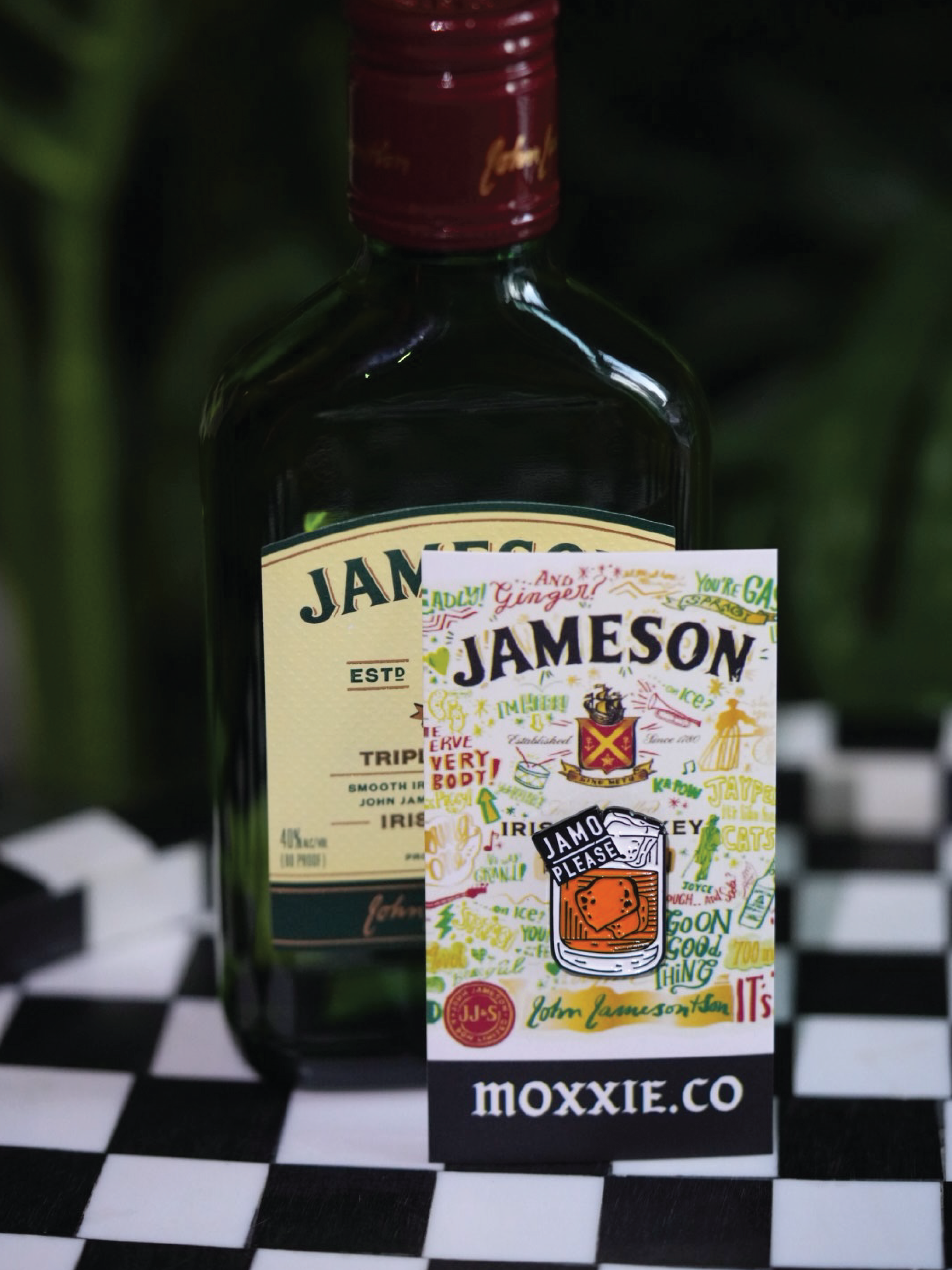 Jamo Please' enamel pin featuring Jameson bottle design, perfect for whiskey lovers and St. Patrick’s Day celebrations.