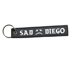 San Diego Emo night essential: Sad Diego woven keychain, the perfect blend of nostalgia and unique design.