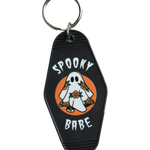 Spooky babe ghost keychain with a floral twist – a hauntingly cute addition to your collection of vintage-inspired accessories.