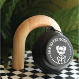 Compact and stylish collapsible pet bowl with a 'Sad to the Bone' graphic, ideal for pet lovers and their dogs on adventures.