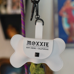 Moxxie White Leather Poop Bag Pouch – sleek faux leather with custom punk button closure and matte black hardware for ultimate convenience.