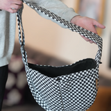 Hands-free comfort with the Moxxie Pet Sling Carrier – perfect for keeping your pet close and cozy on the go. Checkered pattern is perfect for emo vibes. 