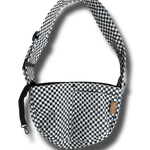 A small dog carrier sling in black and white checkers, designed for hands-free travel and walking. This adjustable, soft, and secure puppy carrier fits dogs and cats weighing 3-10 pounds.