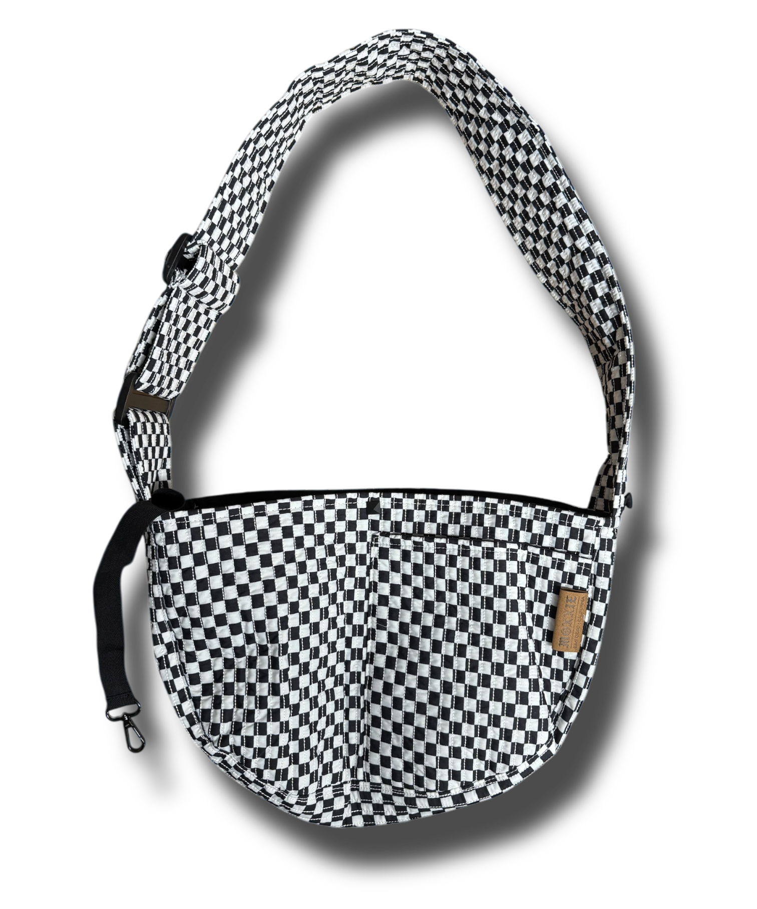 A small dog carrier sling in black and white checkers, designed for hands-free travel and walking. This adjustable, soft, and secure puppy carrier fits dogs and cats weighing 3-10 pounds.