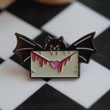Show your spooky side with this Batty for You lapel pin, perfect for Halloween lovers and pin collectors.