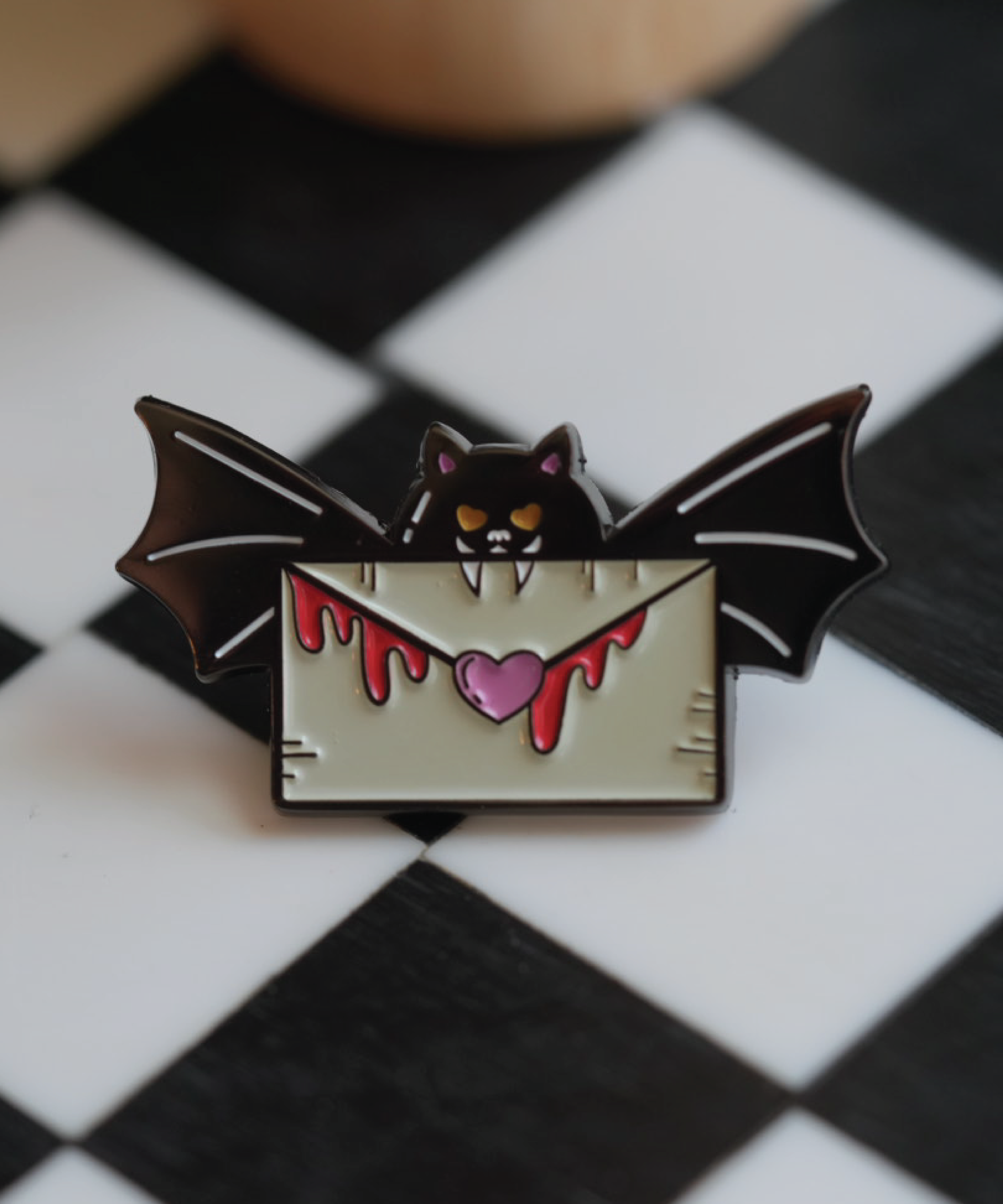 Show your spooky side with this Batty for You lapel pin, perfect for Halloween lovers and pin collectors.
