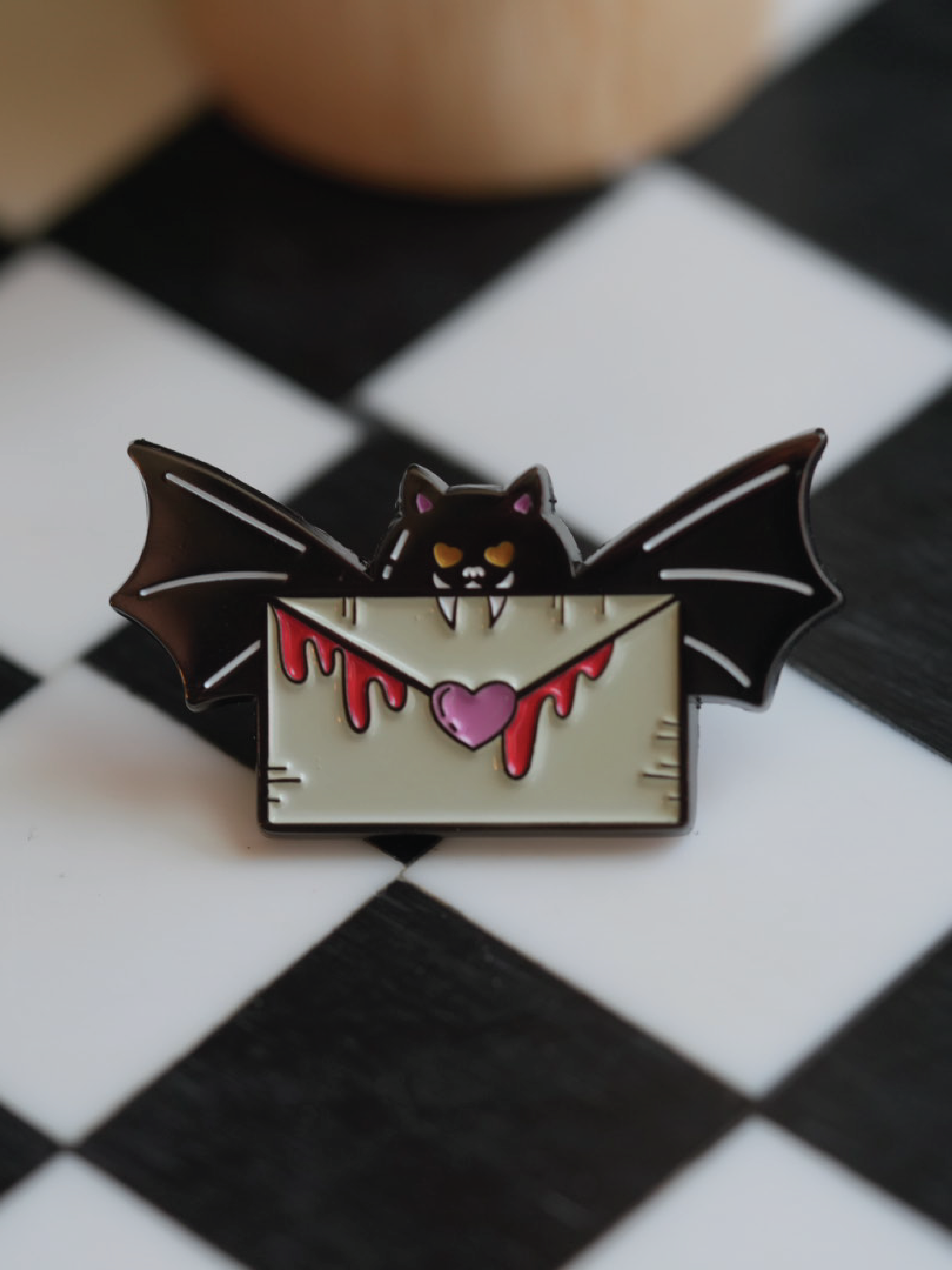 Show your spooky side with this Batty for You lapel pin, perfect for Halloween lovers and pin collectors.