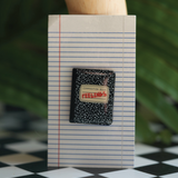 Sad Boy/Sad Girl 'Feelings' notebook pin, a journal-inspired accessory for your emotional journey.