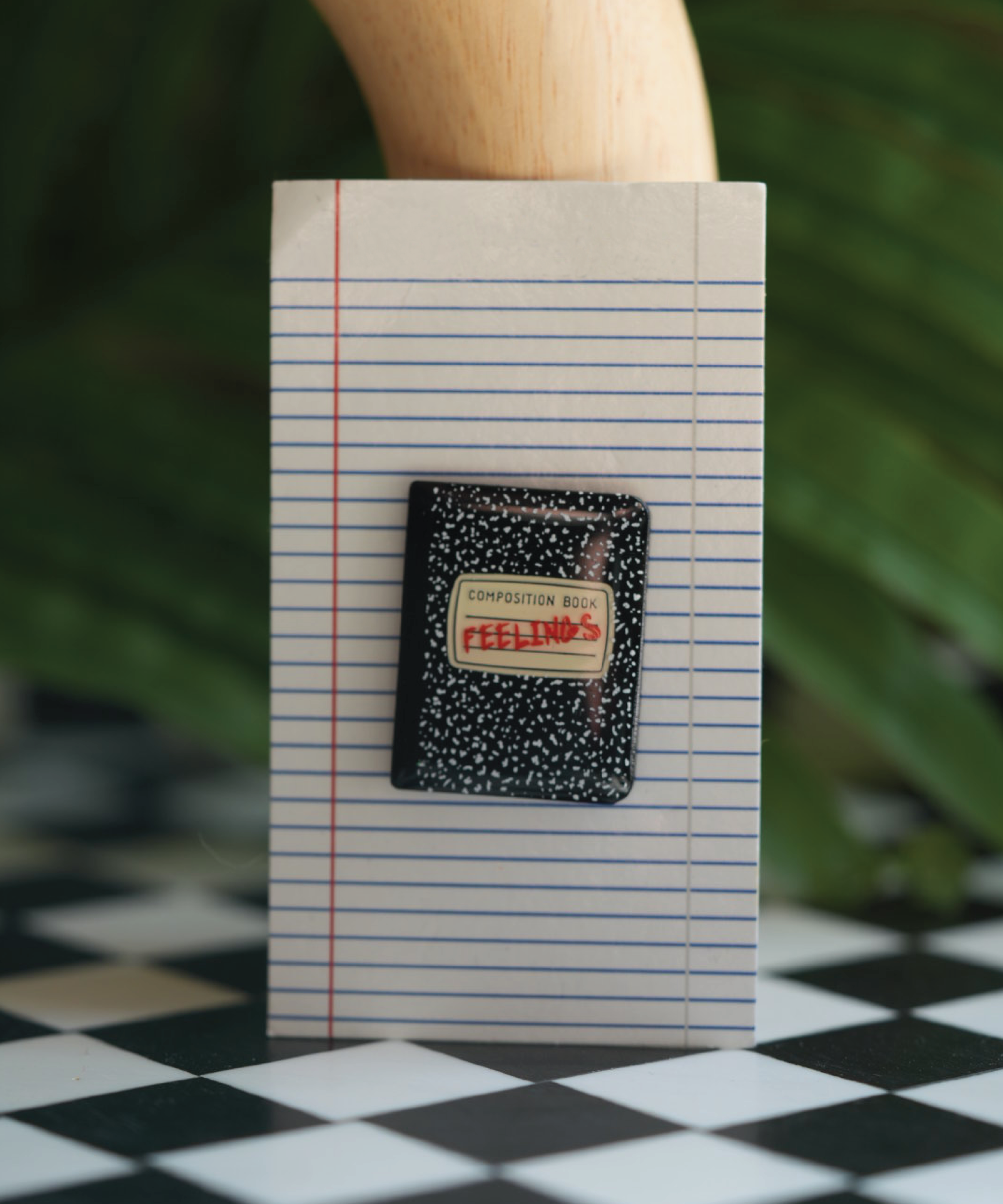 Sad Boy/Sad Girl 'Feelings' notebook pin, a journal-inspired accessory for your emotional journey.