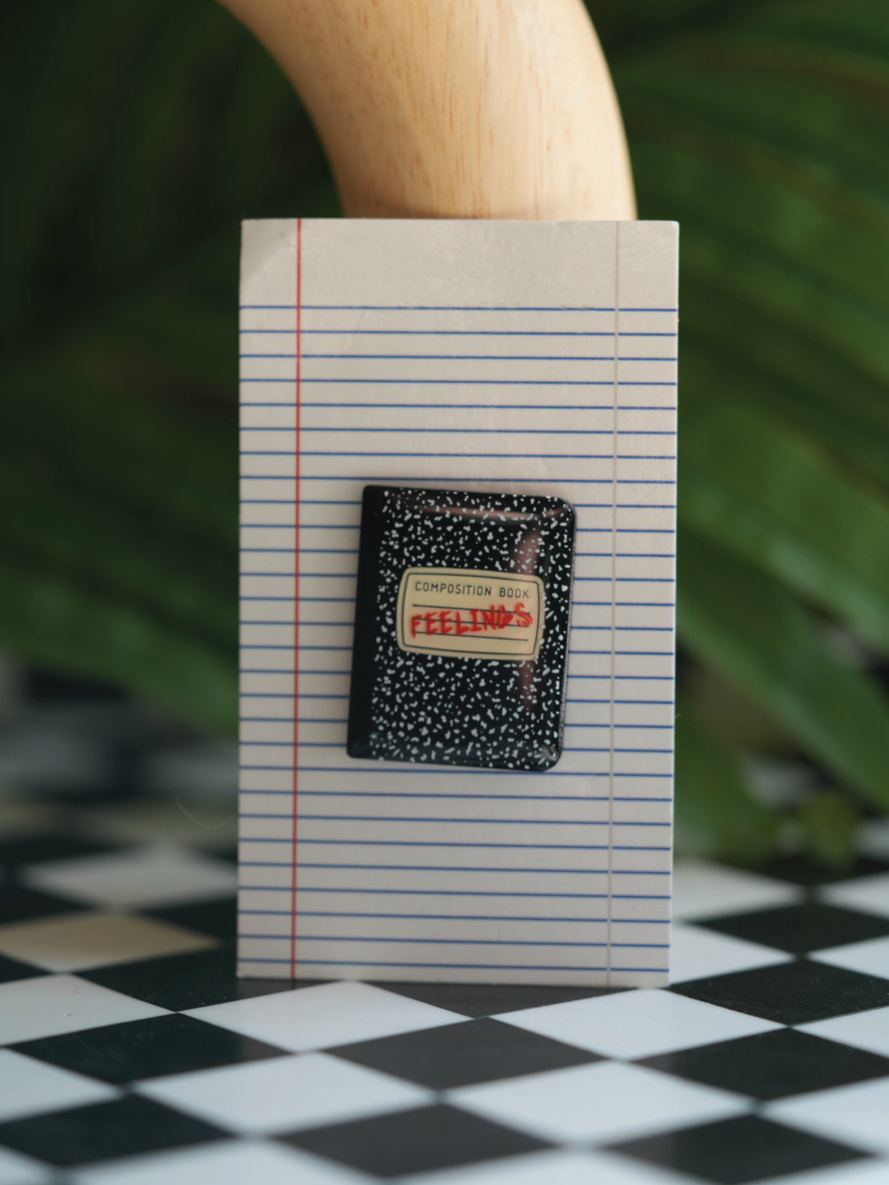 Sad Boy/Sad Girl 'Feelings' notebook pin, a journal-inspired accessory for your emotional journey.