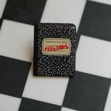 Hide your "FEELINGS" in this composition book pin. 