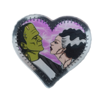 Emo-inspired Frankenstein and Bride pin, featuring spooky romance in a heart shape – perfect for lovers this Halloween.