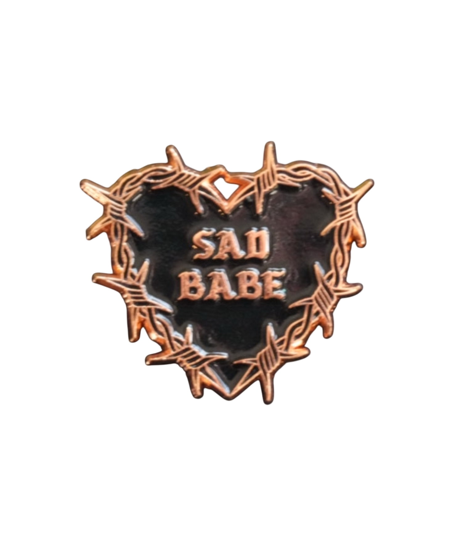 Embrace your sad girl vibes with this Sad Babe pin, featuring a barbed wire heart and classic tattoo art.