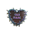 Add a metallic rainbow of color to your pin collection with this Sad Babe pin, featuring a barbed wire heart in rainbow metal and a traditional tattoo design.