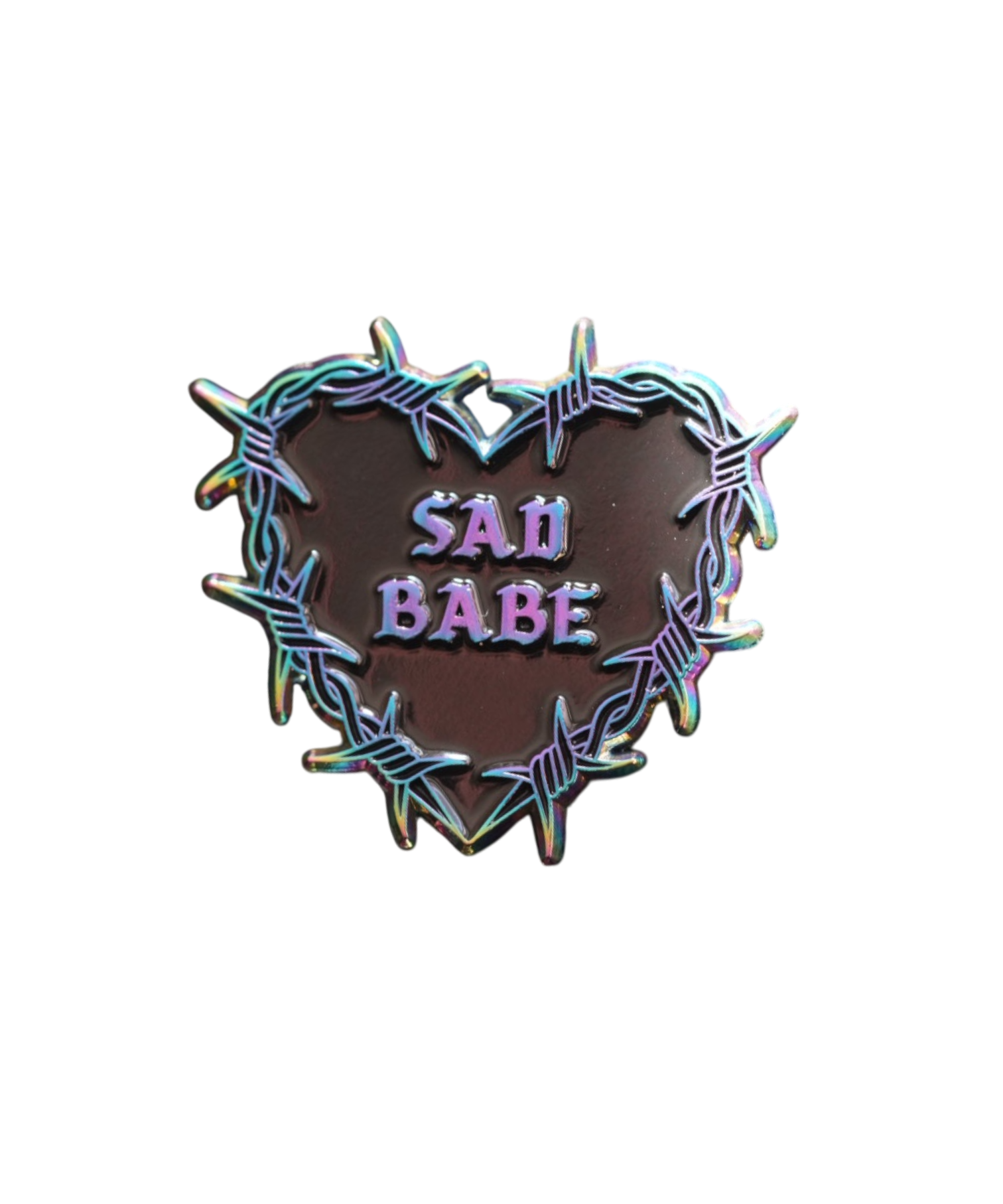 Add a metallic rainbow of color to your pin collection with this Sad Babe pin, featuring a barbed wire heart in rainbow metal and a traditional tattoo design.