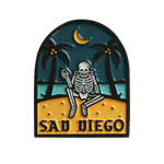 Sad Diego pin with a skeleton by the moonlit beach – a must-have for Sad Boys and emo fans in San Diego.