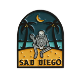 Sad Diego pin with a skeleton by the moonlit beach – a must-have for Sad Boys and emo fans in San Diego.