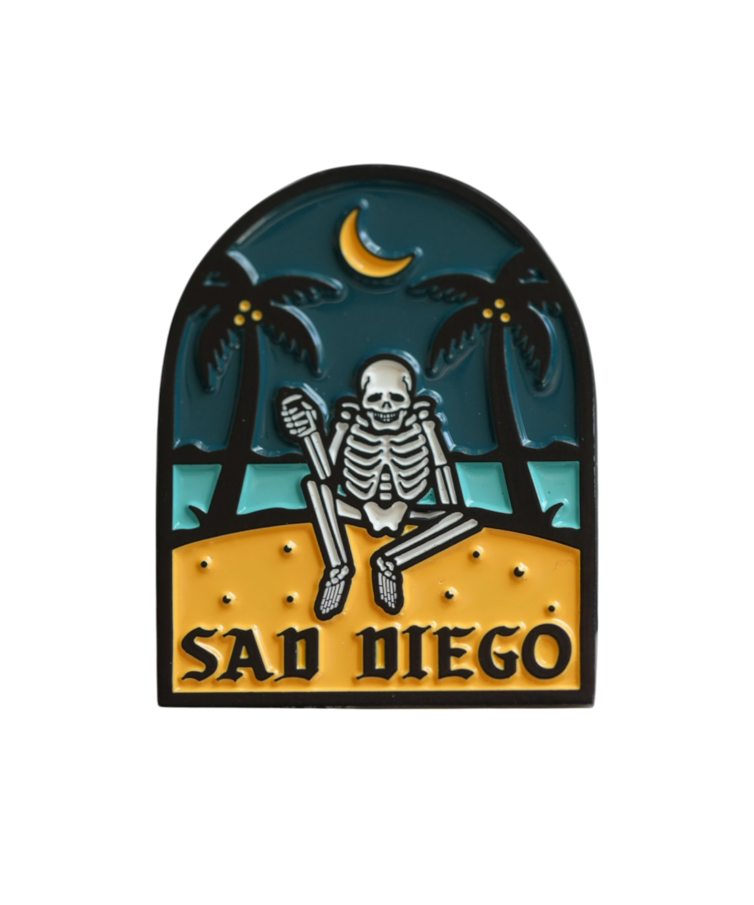Sad Diego pin with a skeleton by the moonlit beach – a must-have for Sad Boys and emo fans in San Diego.