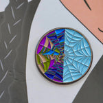 For fans of the Addams Family, this Wednesday Addams pin set is a must-have addition to your spooky pin collection. Close-up image of the spider web window. 