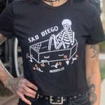 Sad Diego Coffin Crop Tee featuring a skeleton design, perfect for Emo Night lovers and fans of unique fashion. Show off your Sad Diego style with this edgy crop top.