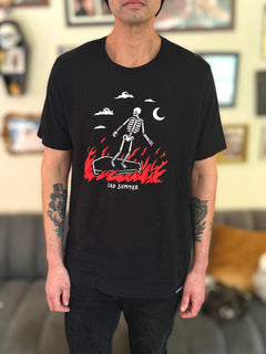 Sad Summer Unisex Tee with a skeleton surfing on a coffin, perfect for SoCal beach vibes, and Emo summer style. San Diego summer must have tee.
