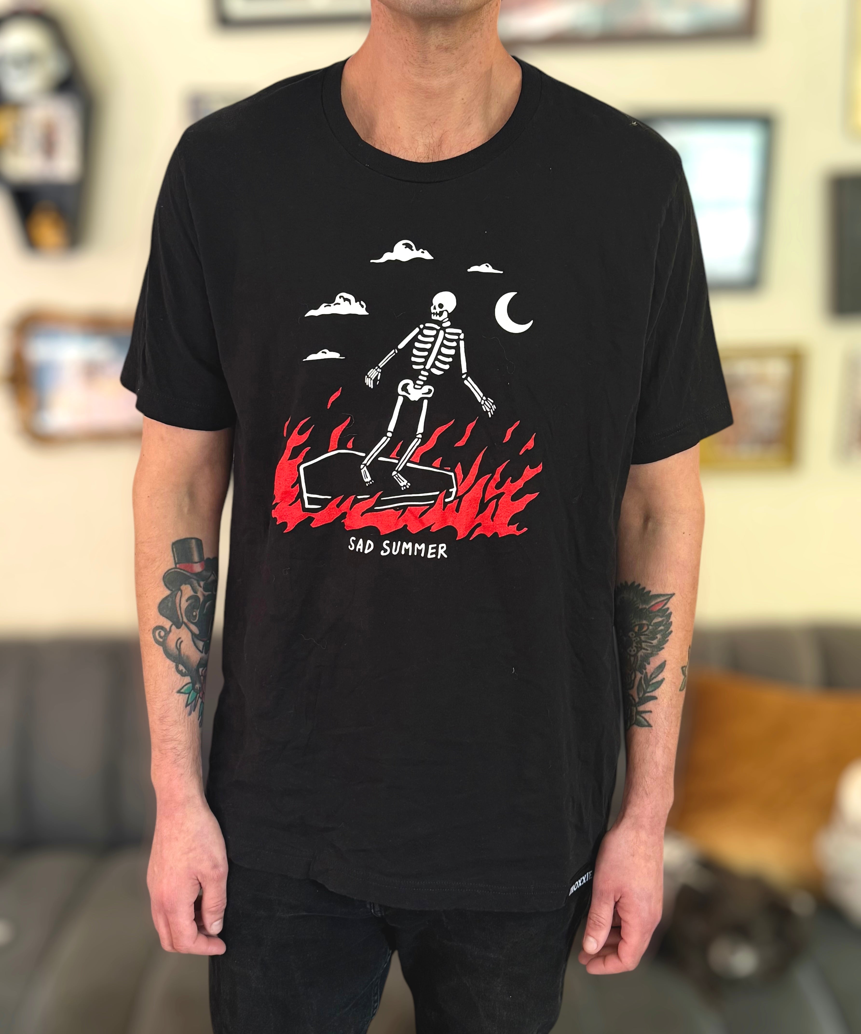 Sad Summer Unisex Tee with a skeleton surfing on a coffin, perfect for SoCal beach vibes, and Emo summer style. San Diego summer must have tee.