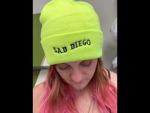 Close-up of the neon yellow Sad Diego beanie, showcasing its bold color and emo-inspired style – perfect for adding a unique touch to your look.