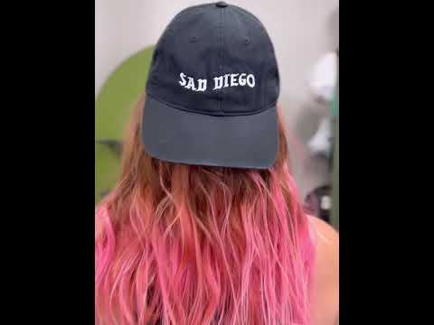 Rock your emo style on the streets of San Diego with the Sad Diego Dad Hat – the ultimate statement piece for your look.