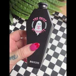 Close-up of the gothic coffin flask – a spooky, emo-inspired barware piece.