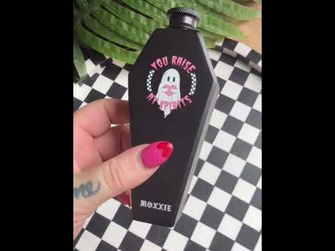 Close-up of the gothic coffin flask – a spooky, emo-inspired barware piece.