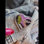 Celebrate spooky romance with this Frankenstein + Bride heart-shaped pin, ideal for your Halloween and pin collection